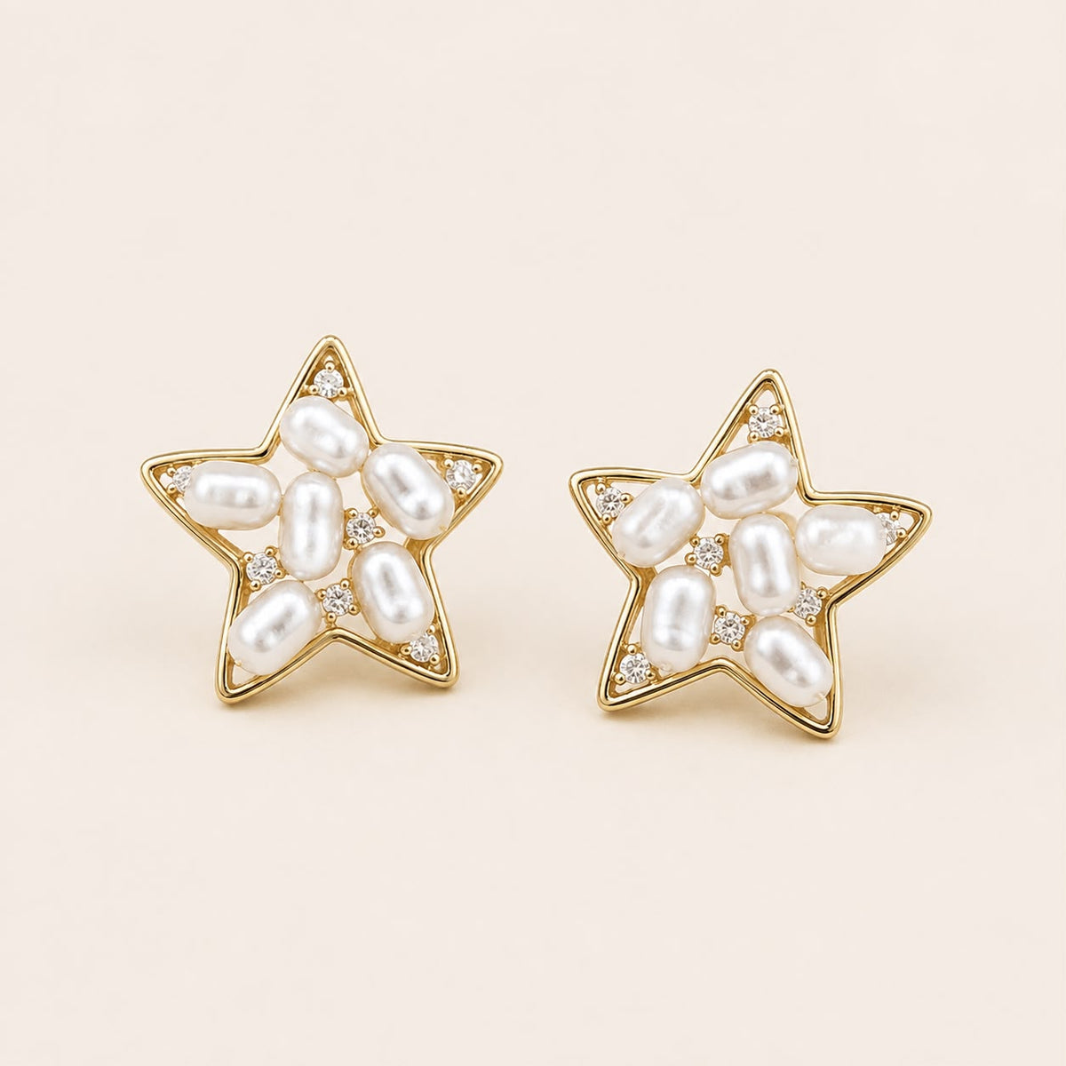 Aretes estrella perlas