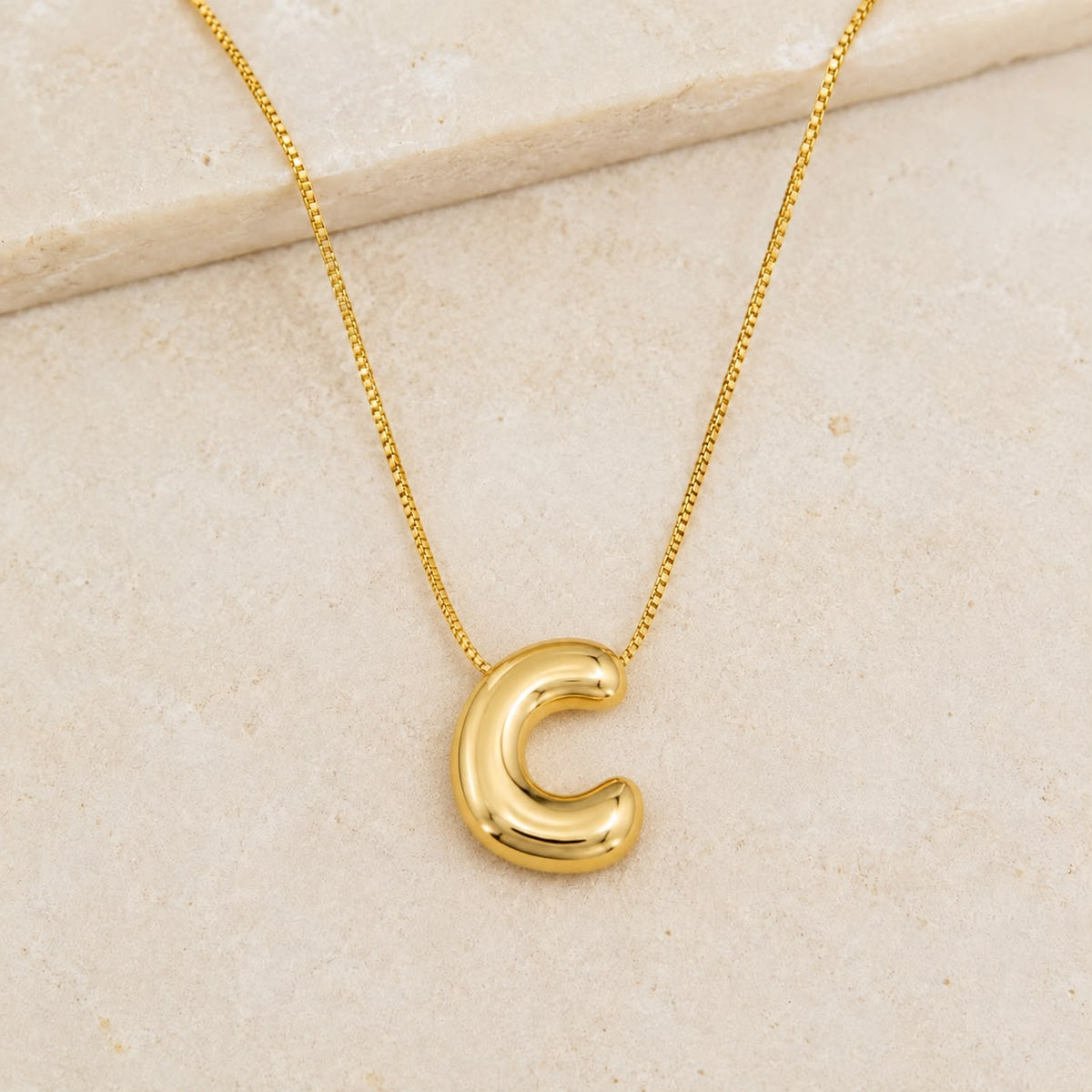 A Collares de Iniciales