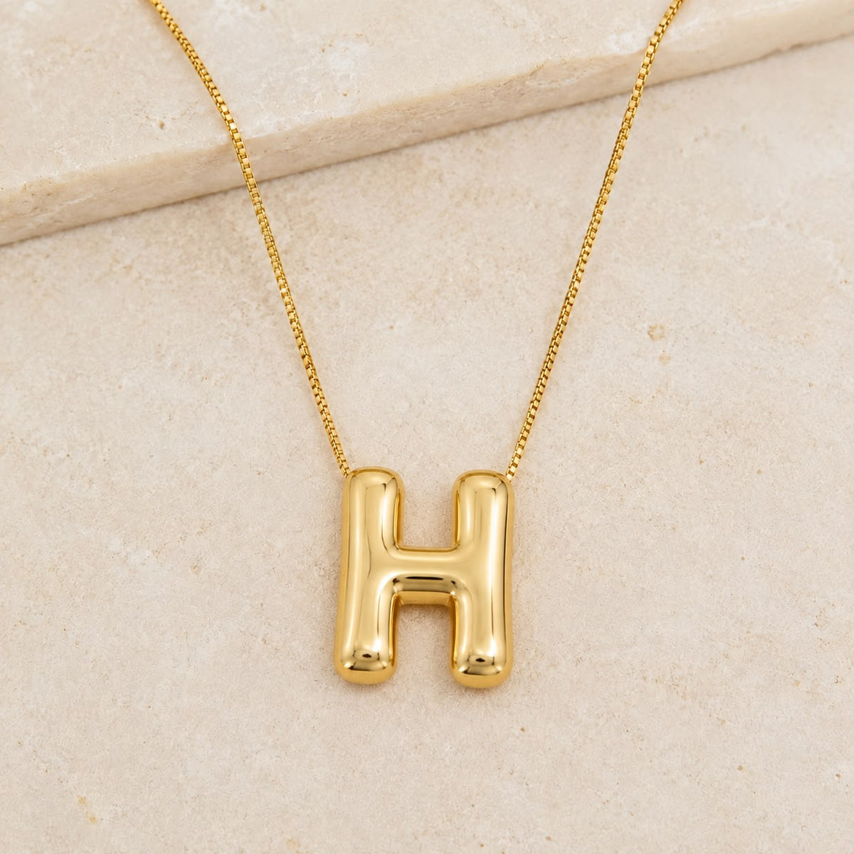A Collares de Iniciales