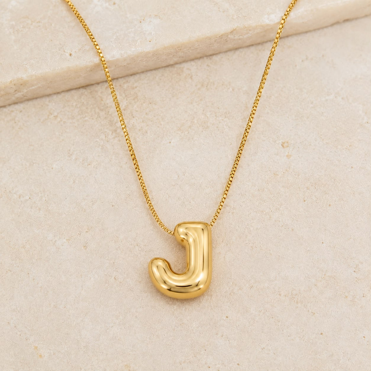 A Collares de Iniciales