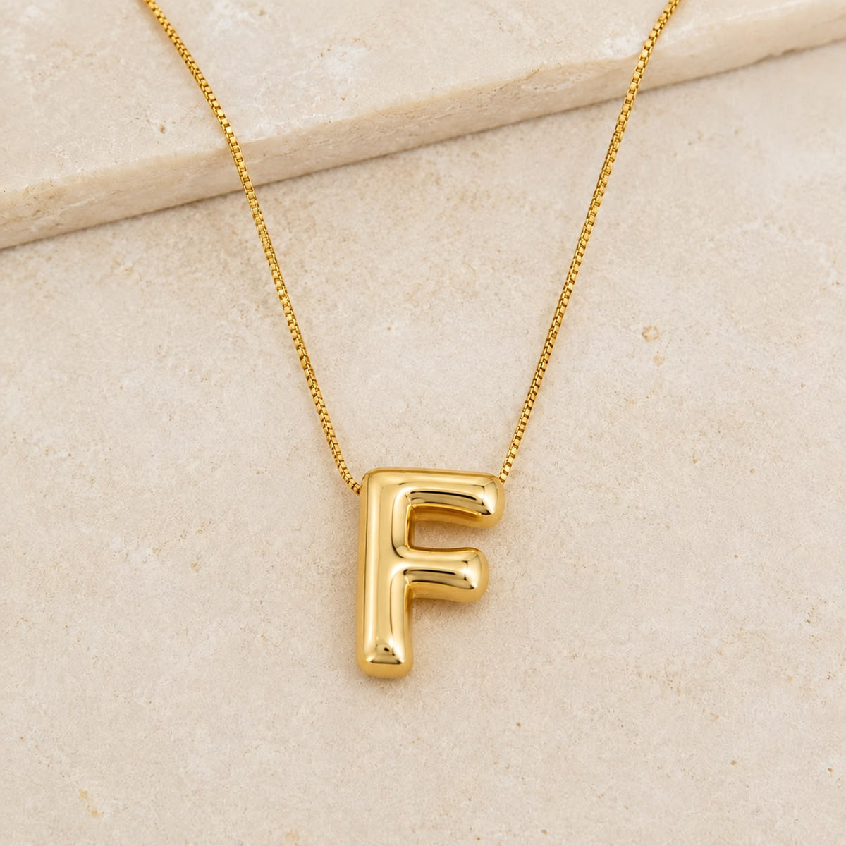 A Collares de Iniciales