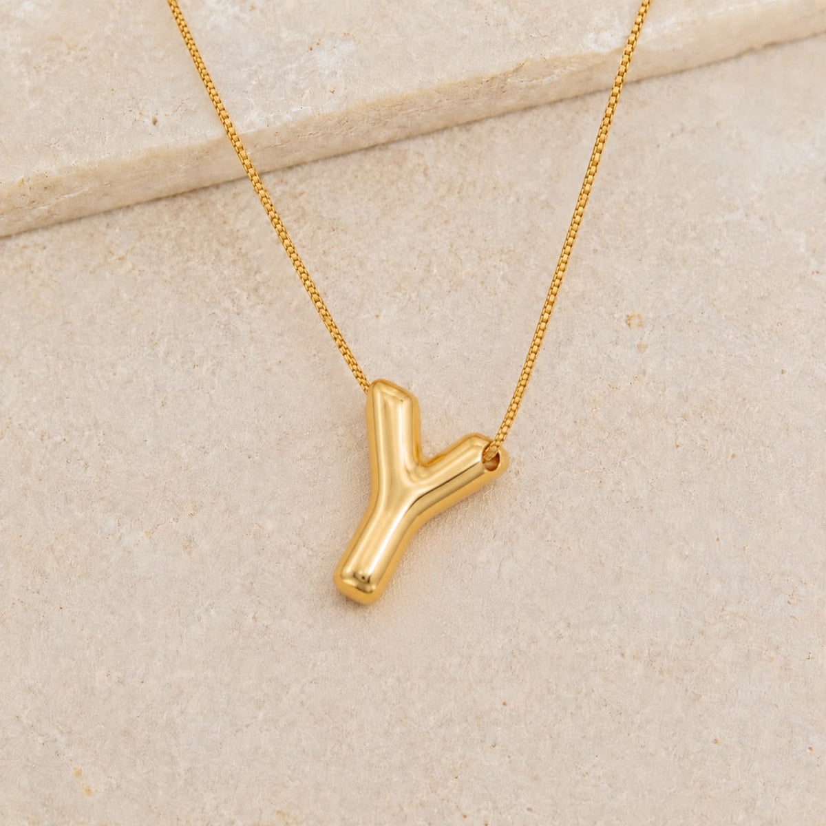 A Collares de Iniciales