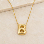 A Collares de Iniciales