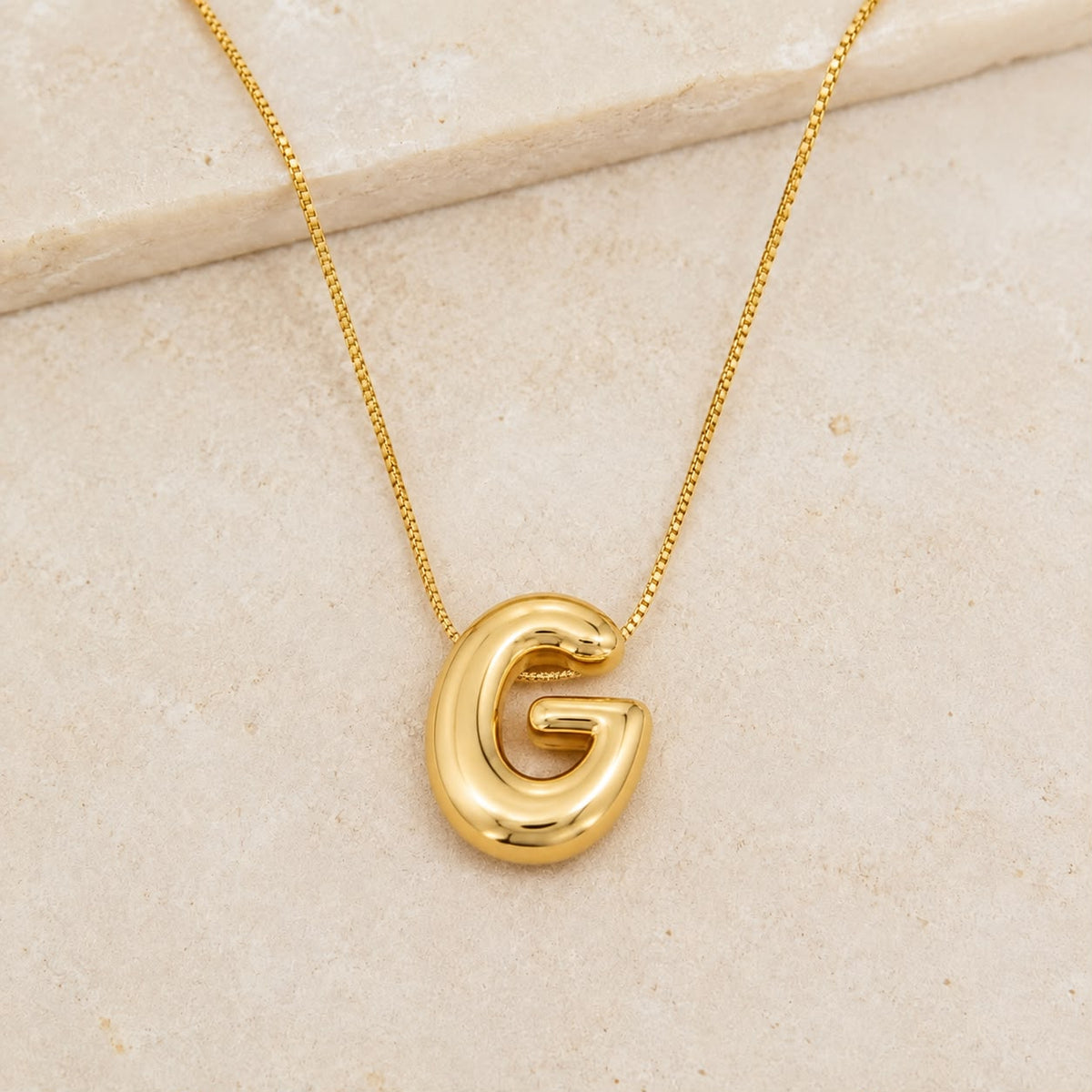 A Collares de Iniciales