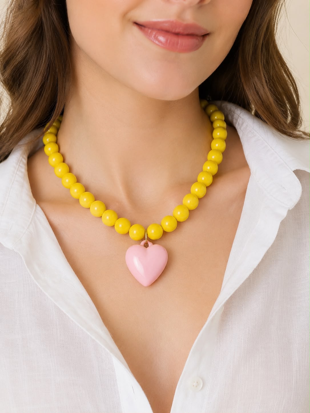 Collar de bolas y dije de corazón