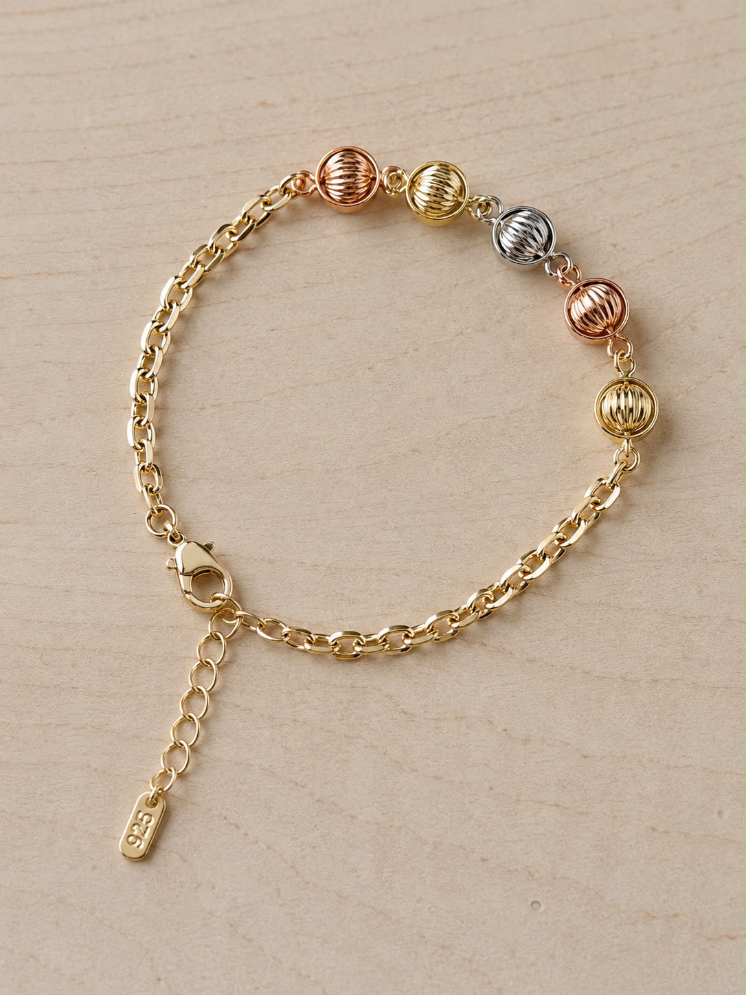Pulsera con balines tonos
