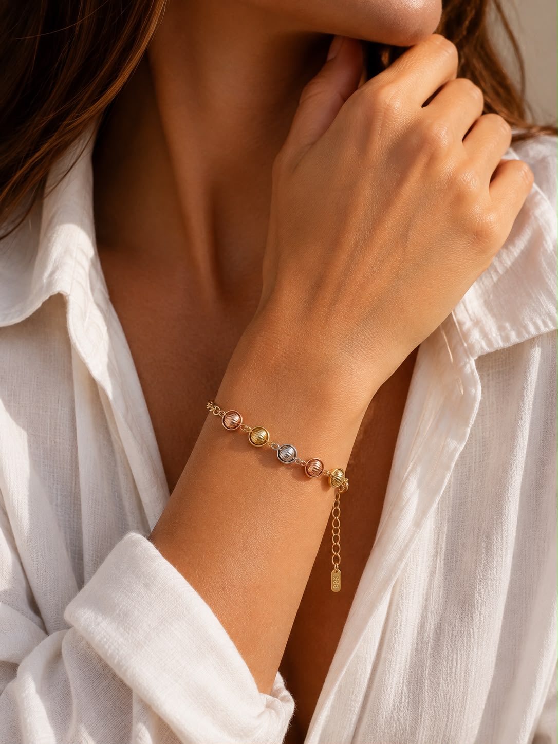Pulsera con balines tonos