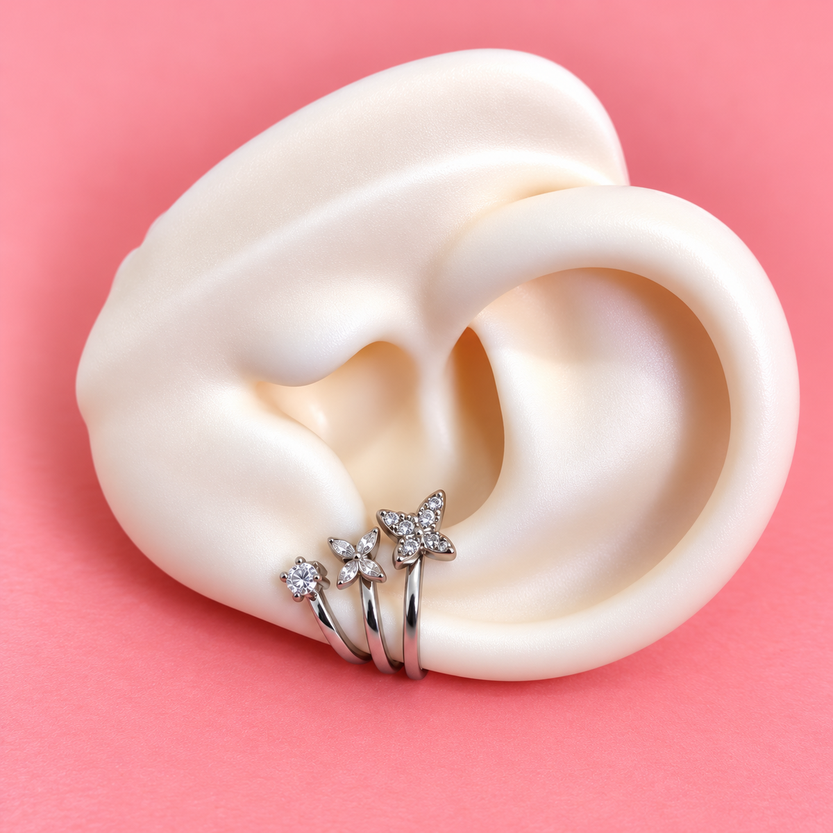 Earcuff plateado tres línea de brillo y mariposas