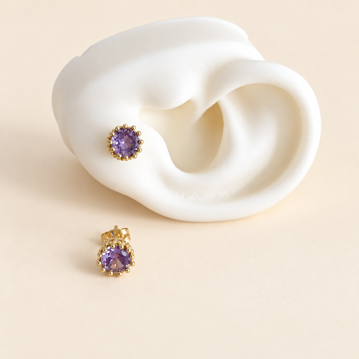 Aretes de piedra lila