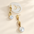 Aretes largo con perla