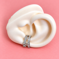 Earcuff plateado doble líneas de  brillo y nudo
