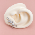 Earcuff plateado de zircones