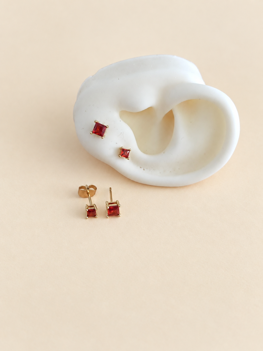 Aretes duo de cuadrado con piedra naranja