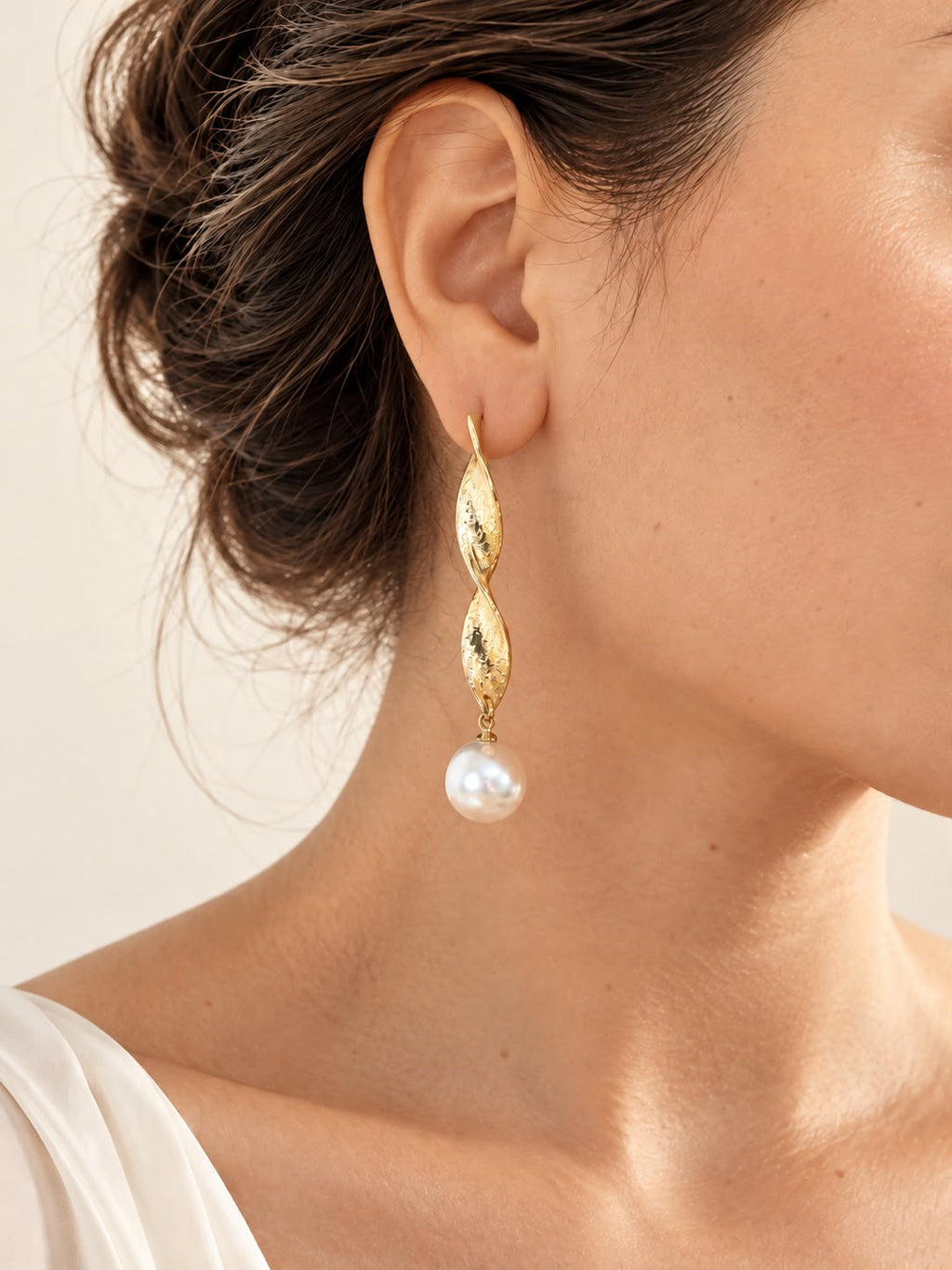 Aretes largo con perla