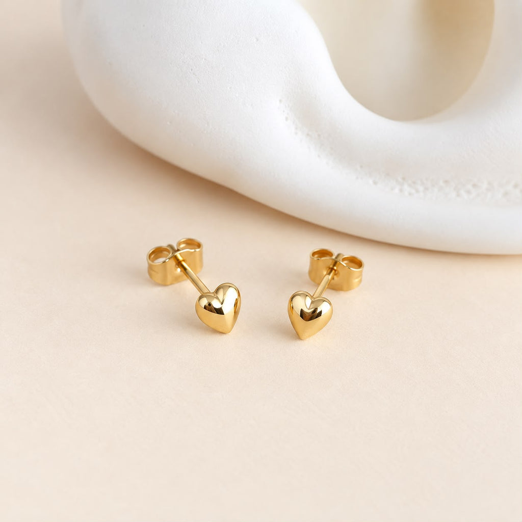 Aretes míni de corazón dorado
