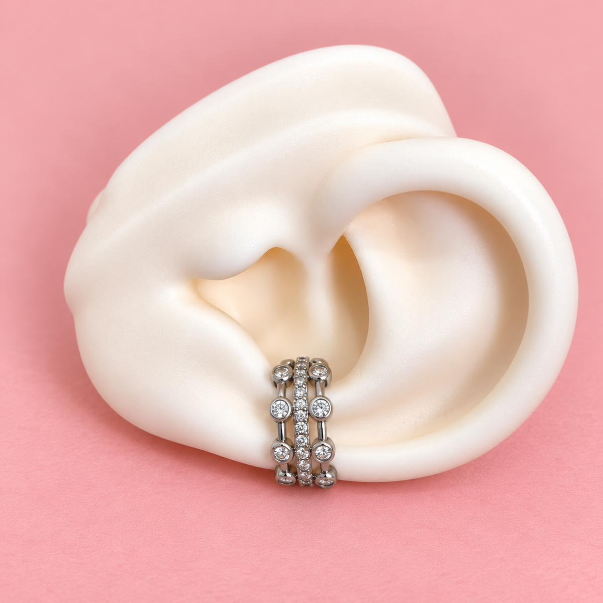 Earcuff plateado de zircones tres líneas